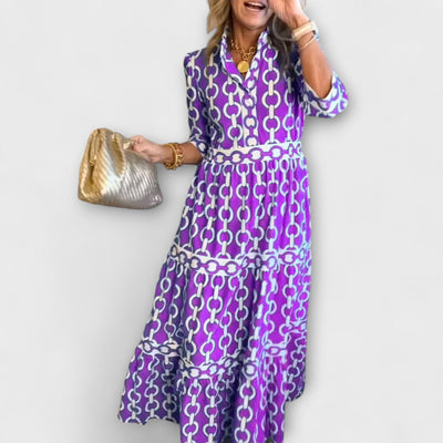 Cévarra™ | Bold Chain Print Midi Dress